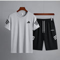 2 Pcs Men's Micro Printed Track Suit - Grey Half-Sleeve Set - product photo 1 | Charming Carry Pakistan